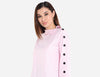 Shirt with buttons on sleeve