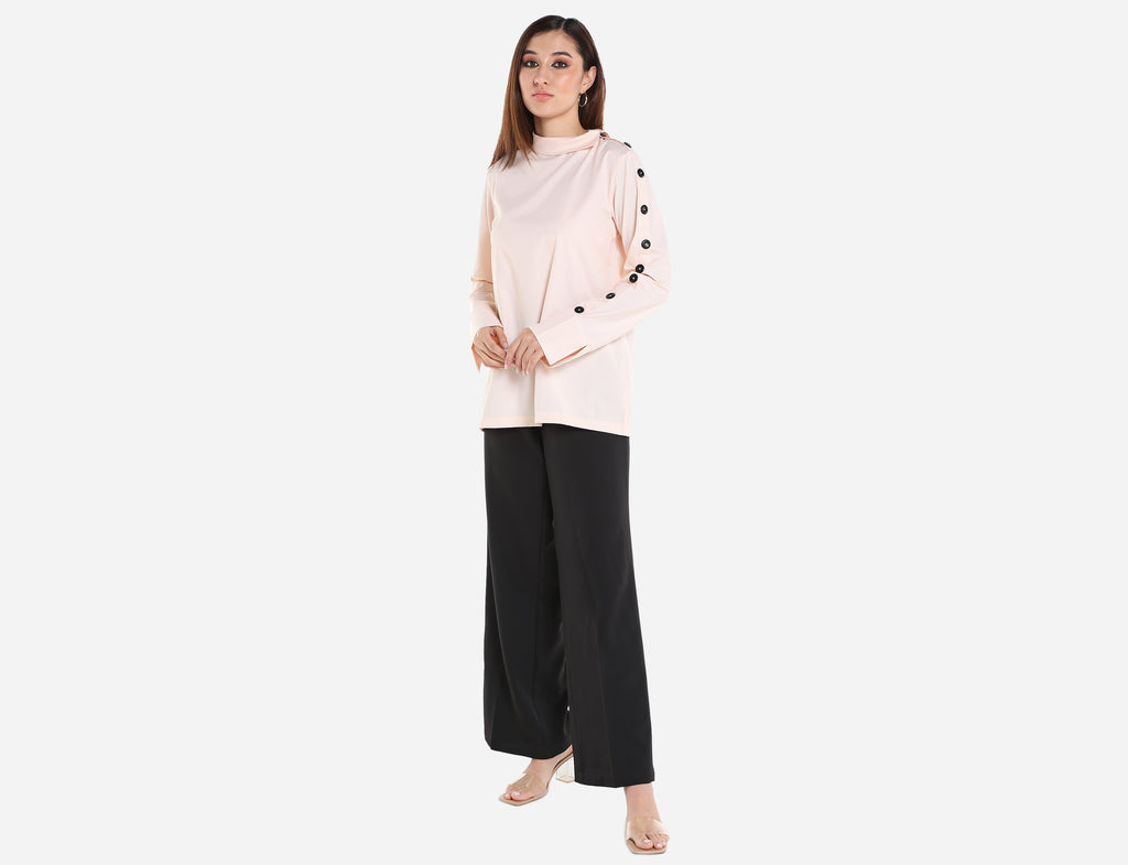 Shirt with buttons on sleeve