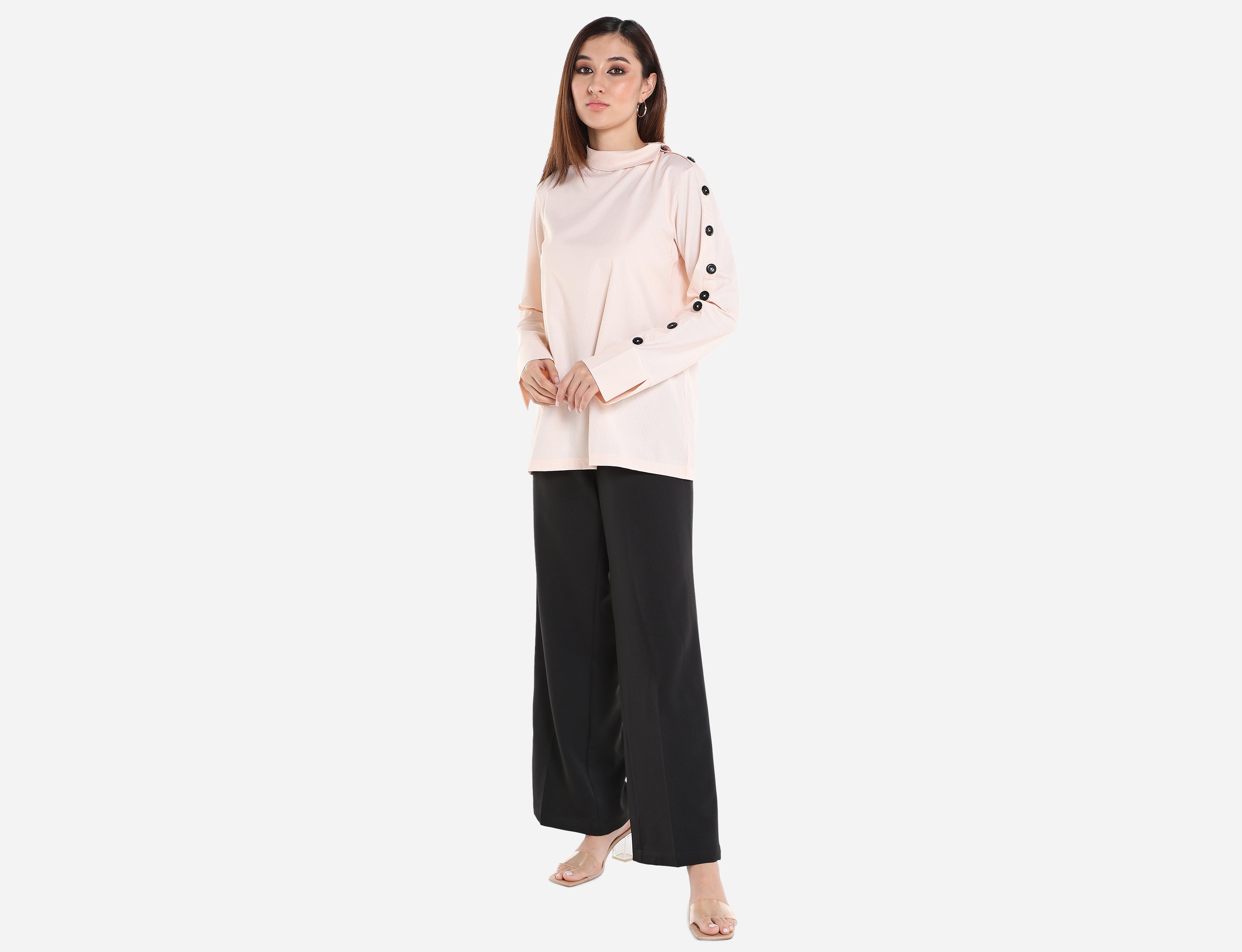Shirt with buttons on sleeve