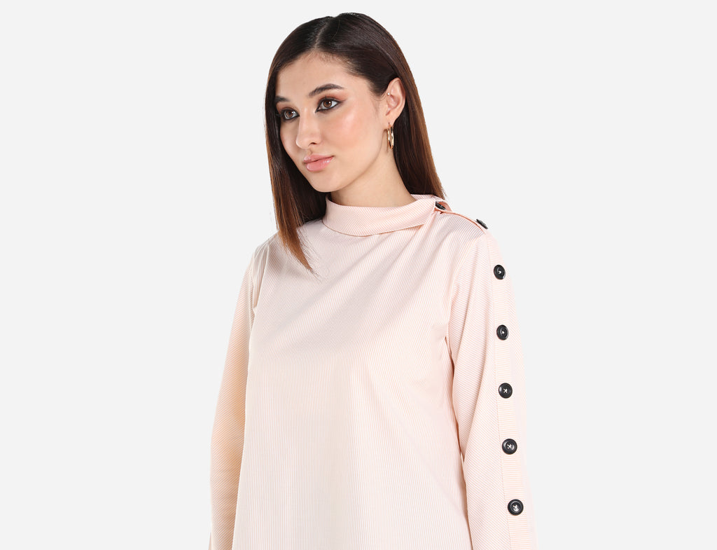 Shirt with buttons on sleeve