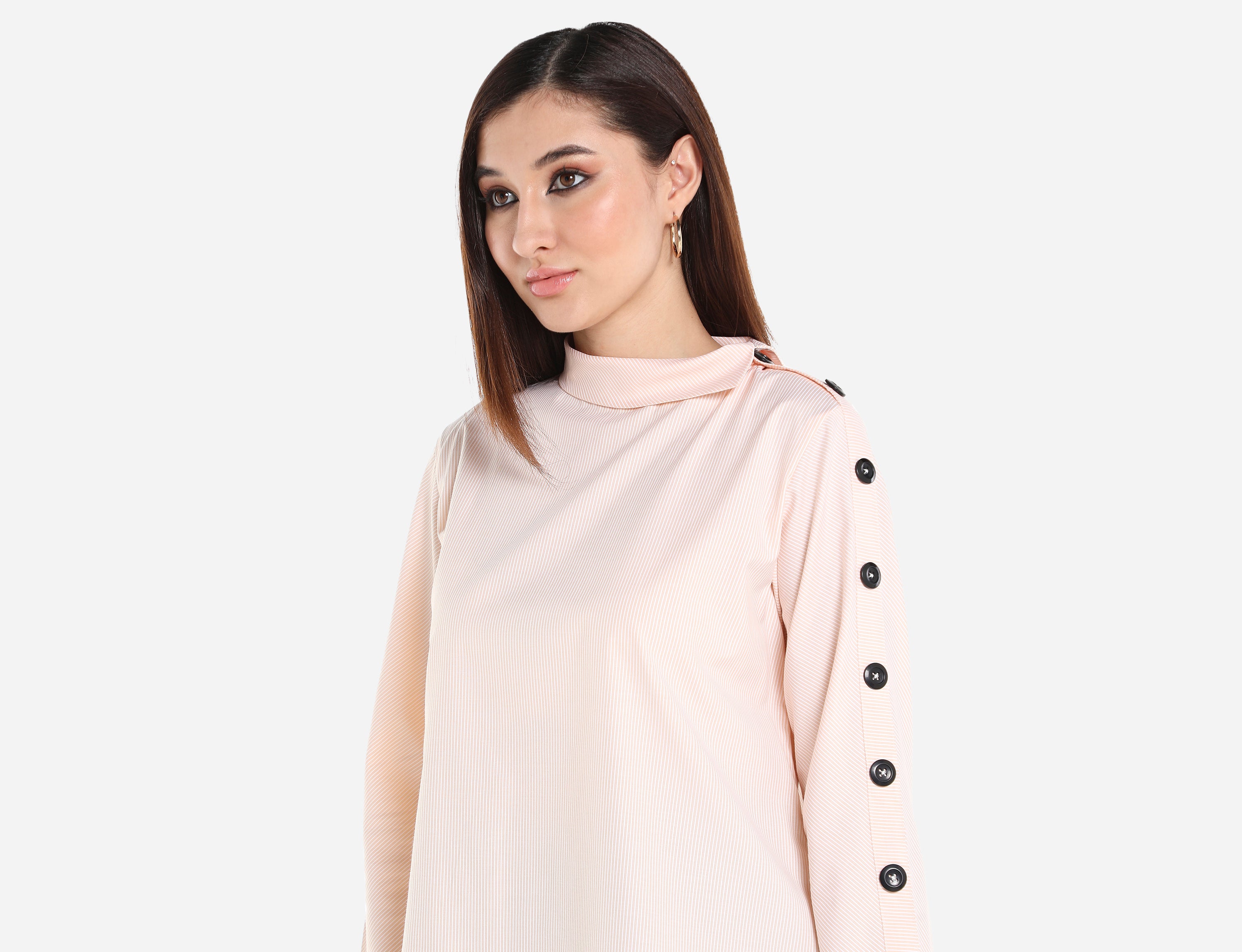 Shirt with buttons on sleeve